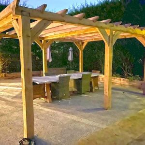 Patio-with-oak-arbour-at-night