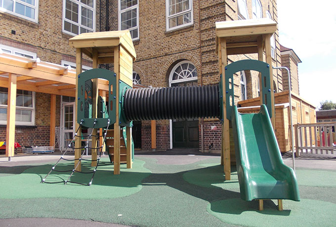 Adventure play towers with linked crawl tunnel
