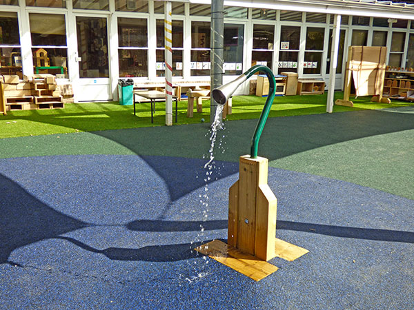 Interesting water feature created from recycling bits from old playground